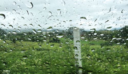 Full frame shot of wet window in rainy season