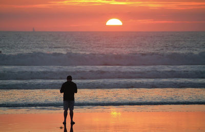 Scenic view of sea at sunset