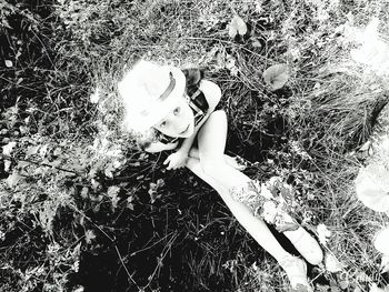 Low section of woman standing on wet ground