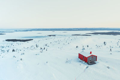 Scenic view of sea against sky during winter