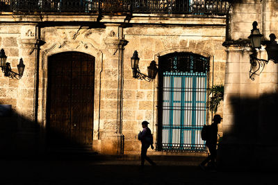 People walking outside building