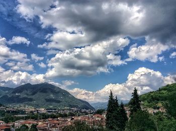 Scenic view of mountains against cloudy sky