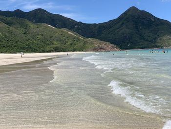 Scenic view of beach against mountains