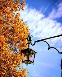 Low angle view of street light against sky