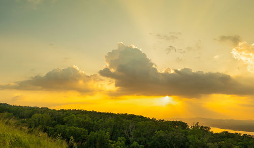 Scenic view of dramatic sky during sunset