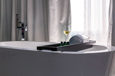 View of wine glass on table at home