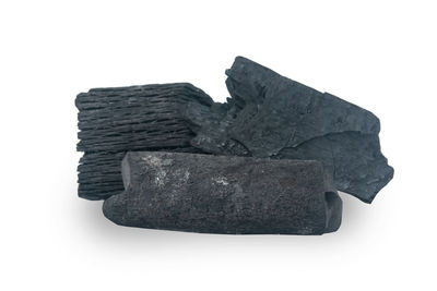 Close-up of stone against white background