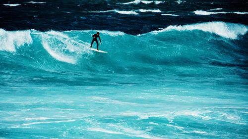 Man surfing in sea