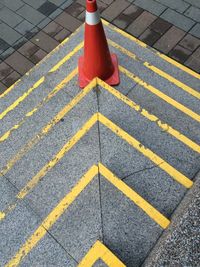 High angle view of traffic cone on steps