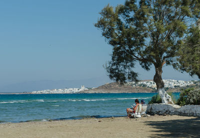 Scenic view of beach against clear sky