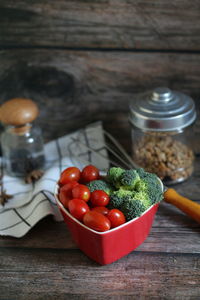 Fruits in container on table