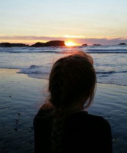 Scenic view of sea at sunset