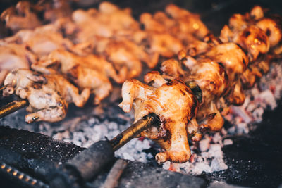 Close-up of meat on barbecue