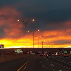 Road passing through dramatic sky