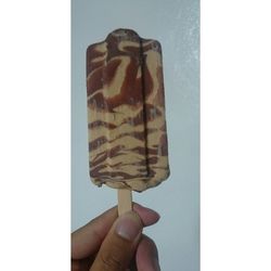 Cropped image of hand holding over white background