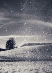 Scenic view of sea against sky during winter