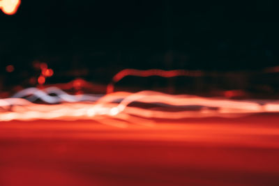 Close-up of light trails against blurred background