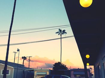 Low angle view of street light against sky at night