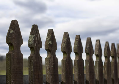 Close-up of wood against sky