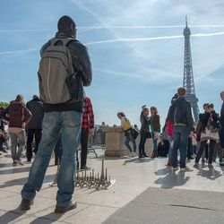 Tourists looking at eiffel tower