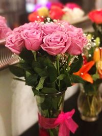 Close-up of pink roses in vase