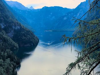 Scenic view of lake with mountain range in background