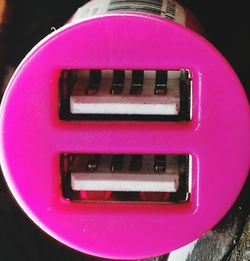 Close-up of pink machine