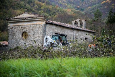 Abandoned building on field