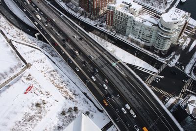 High angle view of vehicles on road in winter