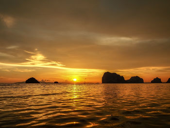 Scenic view of sea against sky during sunset