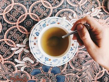 Directly above shot of coffee cup on table
