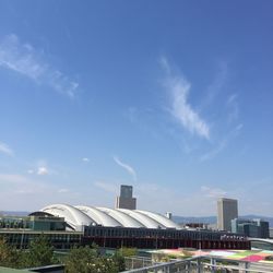 Modern city against sky