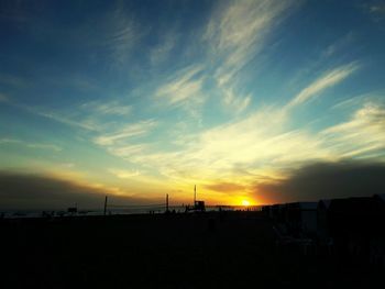 Scenic view of silhouette landscape against sky during sunset