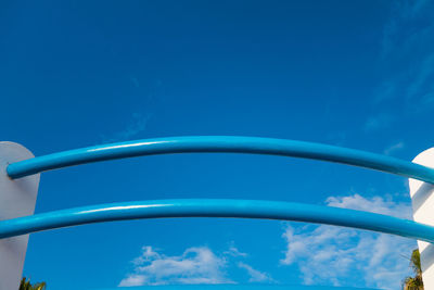 Low angle view of metal structure against sky