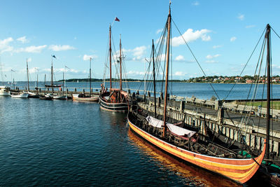 Boats moored in harbor