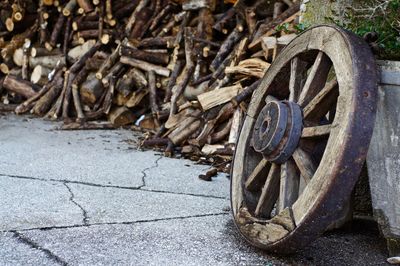 Abandoned wagon wheel on road