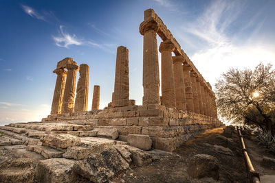 Low angle view of old ruins against sky