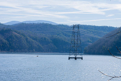 Industrial tower on lake