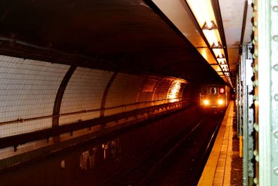 Railroad station platform at night