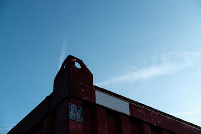 Low angle view of abandoned building against sky