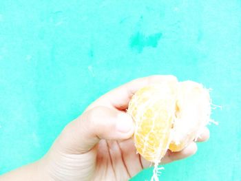 Close-up of hand holding ice cream