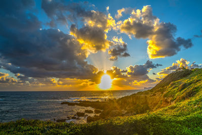 Scenic view of sea against sky during sunset