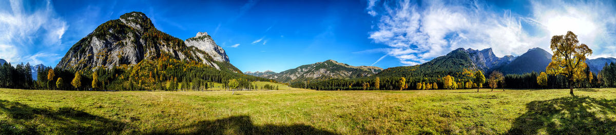 Panoramic view of landscape and mountains against sky