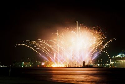 Firework display at night