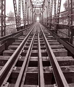 Railway tracks along bridge