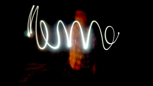 Close-up of illuminated lighting equipment at night