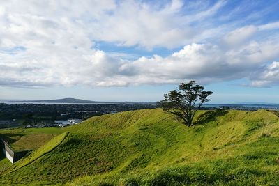 Scenic view of mount wellington against cloudy sky