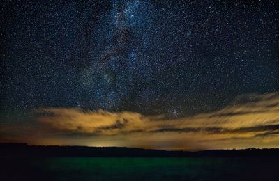 Scenic view of star field against sky at night
