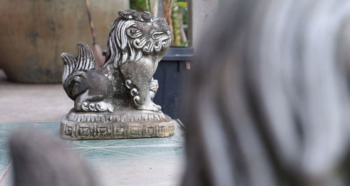 Close-up of statue against blurred background