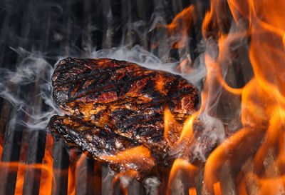 Close-up of bonfire on barbecue grill